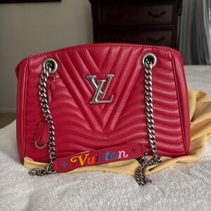 Beautiful authentic preloved Louis Vuitton new wave chain tote in red